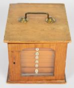 19th / 20thC ash collector's cabinet with glazed door, eight velvet lined numbered drawers and brass