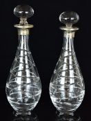 Pair of Elizabeth II hallmarked silver mounted cut glass decanters, Birmingham 2013, maker W I