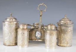 Persian, Iranian or similar silver cruet set comprising two lidded pots and two shakers, the stand