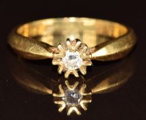 An 18ct gold ring set with a diamond, 4.2g, size N