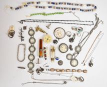 A collection of silver jewellery including cameo bracelet, cufflinks, four rings, five chains, suite