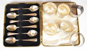 Six various hallmarked silver napkin rings to include a pair of engine turned examples, together