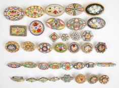 Thirty-seven micro mosaic brooches including 19thC examples, mainly floral designs
