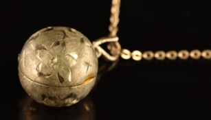 A 9ct gold sphere locket pendant on 9ct gold chain, 7.2g, 50cm