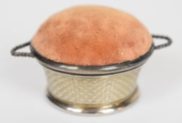 Hallmarked silver twin handled basket pin cushion, Birmingham 1911, maker Levi and Salaman, height