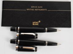 Two Montblanc Bohème ballpoint pens each with black body and platinum plated fittings one set with