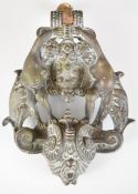 19th or early 20thC brass door knocker, decorated with a pair of cherubs, length 21cm