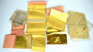 A quantity of gold leaf including a booklet 'George M Whiley Ltd Gold and Silver Beaters'