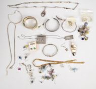 A collection of silver jewellery including earrings, bracelets, necklaces, etc
