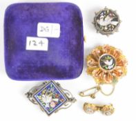A c1900 yellow metal brooch set with micro mosaic floral plaques, c1900 silver brooch and button set
