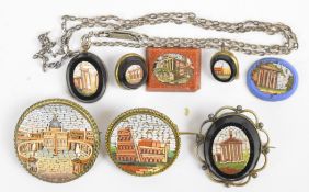 Three micro mosaic brooches and two micro mosaic plaques all depicting buildings, two onyx and micro