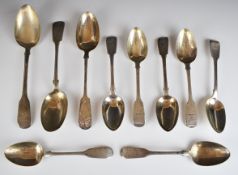 Ten Georgian and Victorian hallmarked silver fiddle pattern spoons comprising three table spoons and