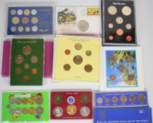 Eight Middle Eastern and other world coin sets comprising Israel 1973, Cyprus (various 1980s dates),