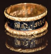 An 18ct gold mourning ring set with black enamel. 'In memory of', 'William Mould Ob 9th January 1837