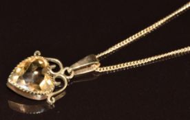 A 9ct gold heart shaped pendant set with smoky quartz (2.7cm) on 9ct gold chain, 5.7g, 44cm