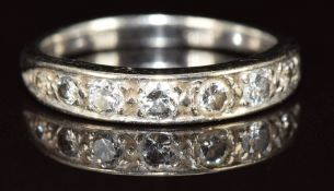 An 18ct white gold half eternity ring set with eight diamonds, 2.4g, size H