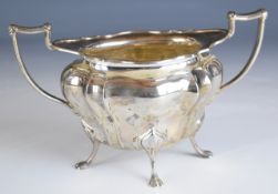 Walker & Hall George V hallmarked silver twin handled silver sugar bowl raised on four feet,