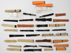 Twenty-five wristwatch straps including Omega, Longines, Baume & Mercier and Ebel, mostly unworn.