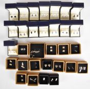 Thirty-one pairs of silver earrings set with diamonds and fourteen enamel set pairs