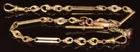 A 9ct gold double Albert / watch chain made up of knotted and elongated links, with yellow metal