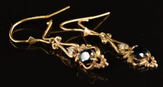 A pair of 9ct gold earrings each set with a sapphire and diamond, 1g