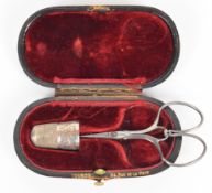 French 19thC cased scissor and thimble set, the scissors and fitted leather case marked Touron,
