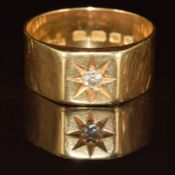 An 18ct gold signet ring set with a diamond in a star setting, London 1929, 8.4g, size R, in antique