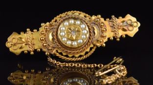 A 15ct gold brooch set with a diamond and pearls, Chester 1902, 6g, 4.5cm
