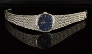 Universal Genève 18ct white gold ladies wristwatch with silver hands and hour markers, blue dial and