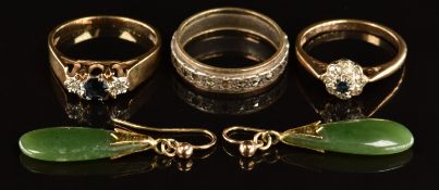 Two 9ct gold rings set with sapphires and diamonds (4.4g), a 9ct gold and silver eternity ring and a