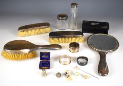 Hallmarked silver and hallmarked silver mounted items comprising hand mirror, three brushes, two cut