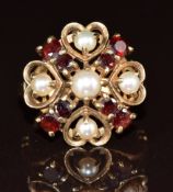 A 9ct gold ring set with pearls and garnets in a cluster, 4g, size K