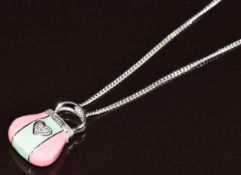 A 9ct white gold pendant in the form of a bag set with enamel and diamonds (1.8cm) on 9ct white gold