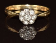 A c1900 18ct gold ring set with diamonds in a flower cluster, 1.4g, size L