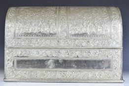 Large dome topped travelling box with embossed silver or nickel covering and twin handles, length