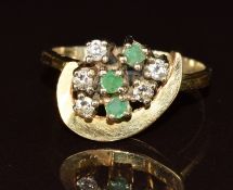 A yellow metal ring set with diamonds and emeralds, 3.5g, size N
