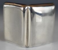 George V hallmarked silver cigarette case with engine turned decoration and gilt interior,