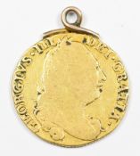 1777 George III gold full guinea with top loop mount