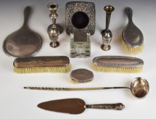 Hallmarked silver mounted items to include hand mirror, four hand brushes, pocket watch holder, salt