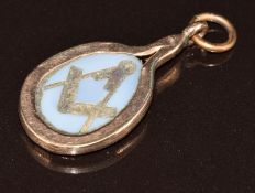 Georgian yellow metal pendant set with a carved agate panel depicting a Masonic symbol, 2.5g, 2.8cm