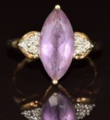 A 9ct gold ring set with a marquise cut amethyst and diamonds, 2.7g, size N