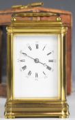 19th century brass cased repeating carriage clock with bevelled glass panels, striking on a gong, in