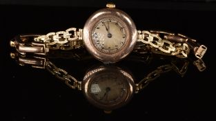 Rolex 9ct gold ladies wristwatch with blued hands, black Arabic numerals, silver dial and signed