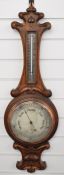 Elkington Art nouveau oak cased aneroid barometer and thermometer with silvered dial and scale and