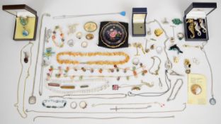A collection of jewellery, some silver including four rings, three necklaces and a St Christopher,