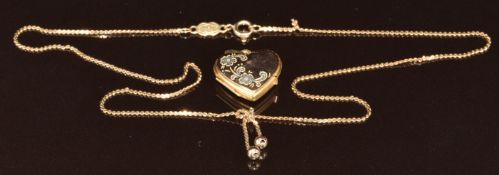 A 9ct gold heart locket (2.2 x 1.8cm) and gold necklace by Uno-A-Erre, 40cm, 4.5g