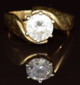 A 14k gold ring set with a cubic zirconia, 6.5g, size R