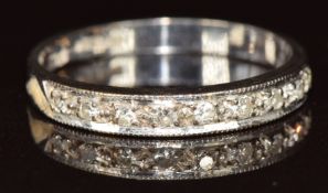 A 9ct white gold half eternity ring set with nine diamonds, 2g, size P