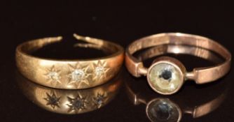 Two 9ct gold rings, one set with three diamonds (band cut) and the other with paste, 3.8g, size O