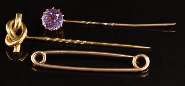 A c1900 18ct gold knot stick pin (6.1g), 9ct rose gold brooch/ pin (3g) and a gilt stick pin
